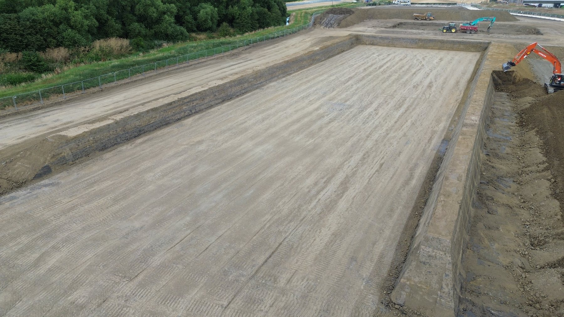 JJMac excavator preparing a large formation area